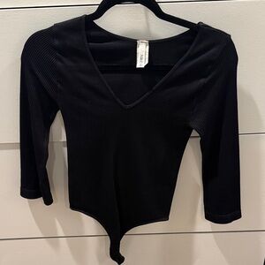 Black Ribbed V-Neck Bodysuit - Bobbles & Lace